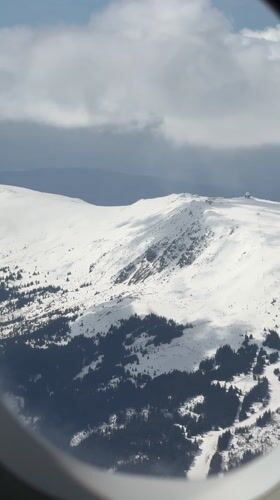 Passenger documents Wizz Air flight experience over Bulgaria mountains
