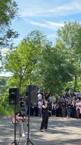 Female singer performs outdoor morning concert in Lovech, Bulgaria