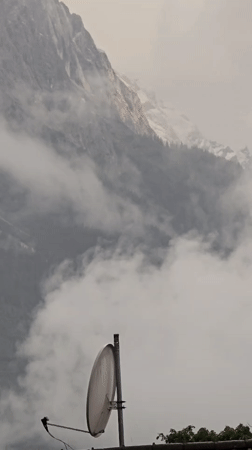 Misty Alpine views documented across Garmisch-Partenkirchen during overcast afternoon