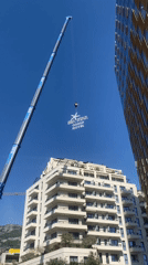 Crane installs Sea Star sign in Rafailovići, Montenegro
