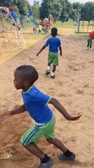 School children play on playground equipment in Akwanga, Nigeria
