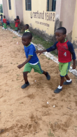 School children play on playground equipment in Akwanga, Nigeria