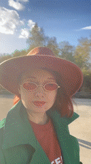 Woman in colorful spring outfit captured in Yekaterinburg park