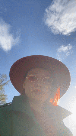 Woman in colorful spring outfit captured in Yekaterinburg park