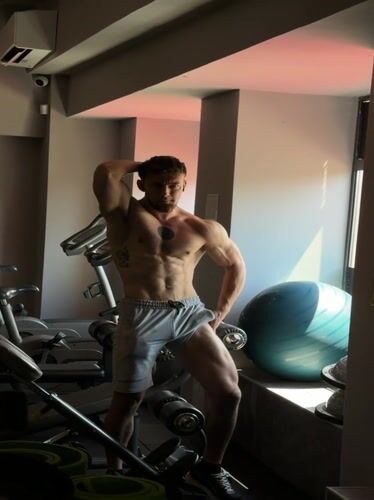 Man poses at gym in Bulgarian coastal town