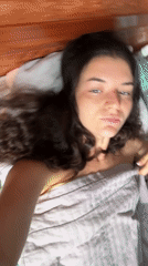 Woman's morning routine captured in Mũi Né bedroom