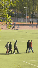 Young people play casual soccer in Tokkari-Lend, Russia