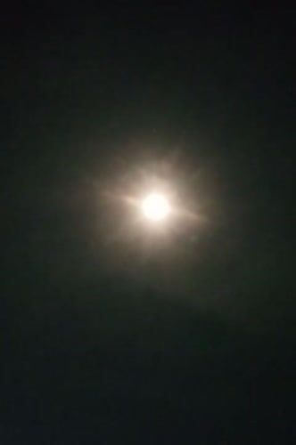 Nighttime scenes documented across Mee, Indonesia including moon, soccer game