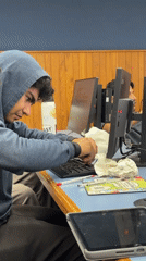 Student works at computer in Cholula workspace