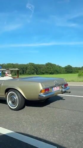 Gold Mercedes convertible spotted on German highway near Pleidelsheim