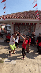Kids play Independence Day games in a Bogor neighborhood