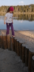 Spring afternoon scenes capture children, wildlife, and forest carvings