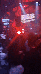 R&B Takeover nightclub event draws dancing crowds under red lights