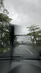 Rainy day bridge crossing captured in Kiriberiya, Sri Lanka