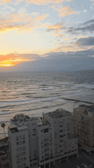 Sunset observed over Mediterranean coast in Bat Yam