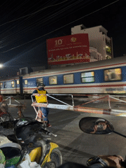 Train crossing and street scenes documented in Nha Trang