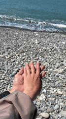 Couple shares playful moment in Sochi morning sunshine