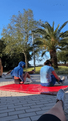 Morning outdoor fitness session and groundskeeping in Budva park