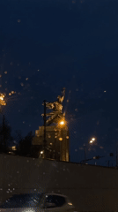 Bronze statue filmed during rainy night in Moscow