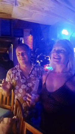 Colorful club night at an outdoor bar in Phu Thuy Ward