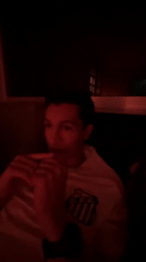 Two people filmed under red lighting in Mexico City