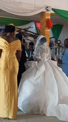 Indoor wedding ceremony documented by witnesses during morning hours
