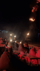 Beach fire show and night market scene at a Southeast Asian coastal venue