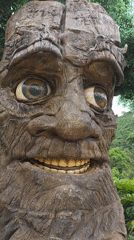 Visitors explore fantasy sculpture garden featuring tree faces in Vietnam