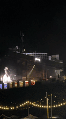 Nighttime concert with large LED stage captured in Nürburg
