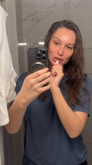 Woman Takes Bathroom Mirror Selfies in Moscow Area