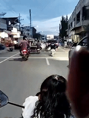 Daily life documented in Lhokseumawe: street traffic, blooming flowers