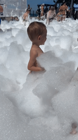 Beach foam party fun in Sochi, Russia