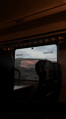 Train passenger captures countryside view during sunrise in Bulgaria