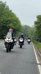 Motorcycle group rides through Rother, UK