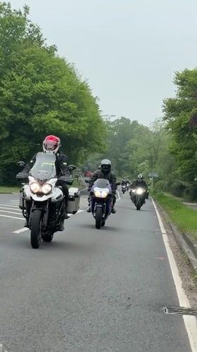 Motorcycle group rides through Rother, UK