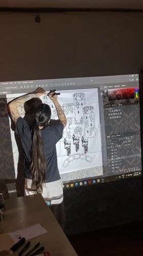 Artist creates digital castle design in Ushuaia workspace