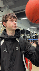Young man visits sporting goods store in Izhevsk