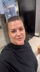 Woman films herself shopping in Novosibirsk clothing store