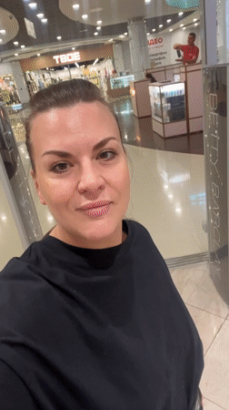 Woman films herself shopping in Novosibirsk clothing store