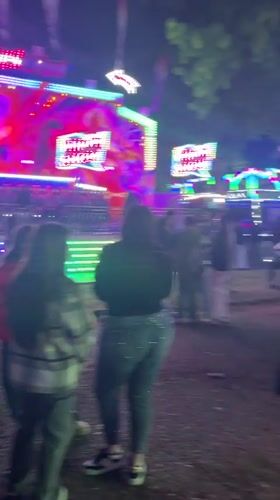 Small nighttime carnival operates in Parvomai, Bulgaria