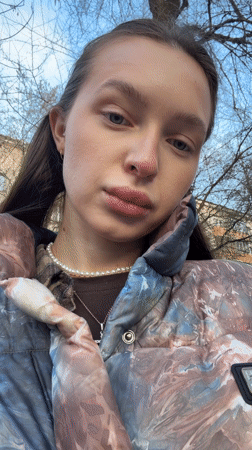 Woman Takes Selfie in Moscow