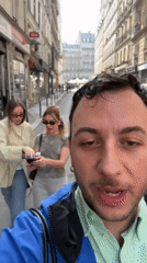 Parisians captured browsing markets, taking selfies on sunny weekend afternoon