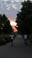 Sunset walk through a Moscow park at golden hour