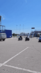 Motorcycles gathered in a sunny Ulyanovsk parking lot