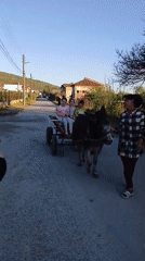 Children play and dance in Bulgarian village streets