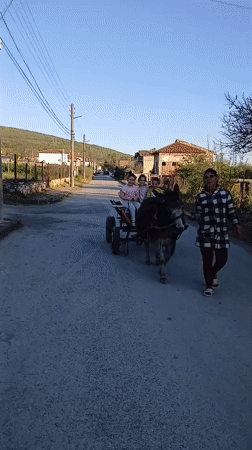 Children play and dance in Bulgarian village streets