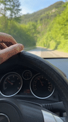 Driver navigates scenic mountain roads in Taran, Bulgaria