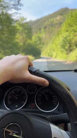 Driver navigates scenic mountain roads in Taran, Bulgaria