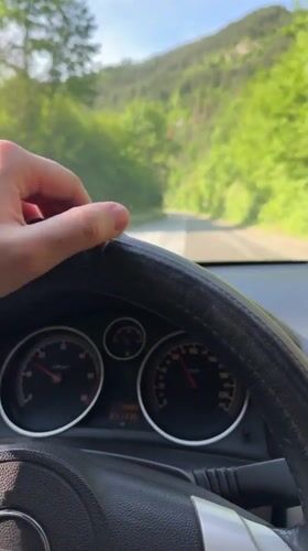Driver navigates scenic mountain roads in Taran, Bulgaria