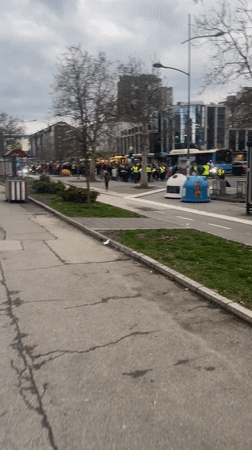 Evening scenes from Novi Sad show traffic, yellow-vest gathering